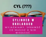 Drewniane okulary z napisem "CYLINDER W OKULARACH". Wyjaśniamy, co musisz o nim wiedzieć.